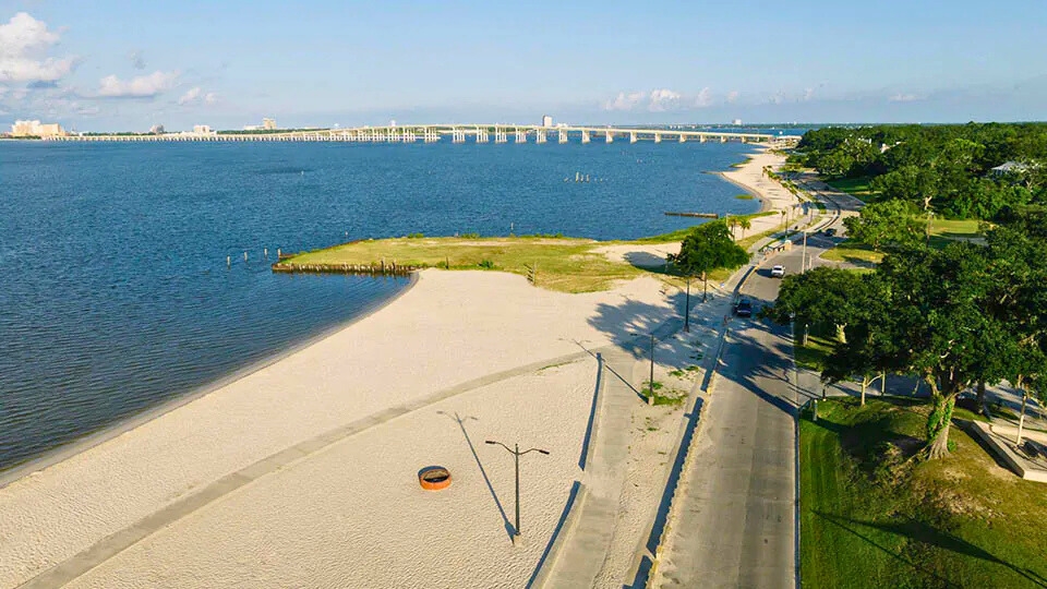 Aerial view of Front Beach in Ocean Springs, Mississippi with the Biloxi bridge on the Gulf Coast